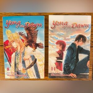 Yona of the Dawn volumes 8 and 11, story and art by Mizuho Kusanagi